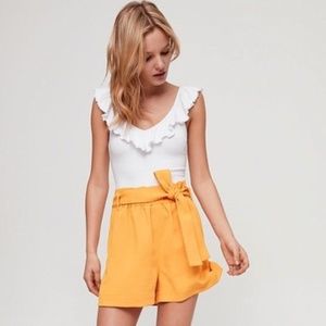 WILFRED white ruffle bodysuit